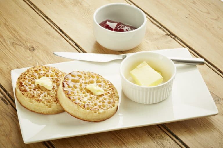 Crumpets toasted on white dish