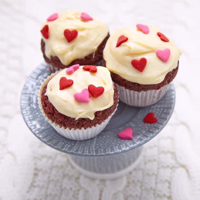 Red velvet cupcakes decorated with hearts